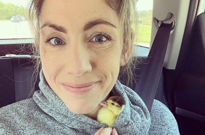  A woman found a newborn duck and took her home.