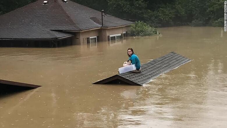  Girl And Her Dog Sat On The Roof For About Five Hours To Be Rescued From Severe Flood